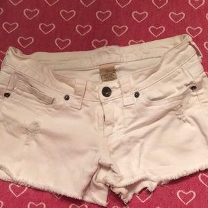 White fringe shorts